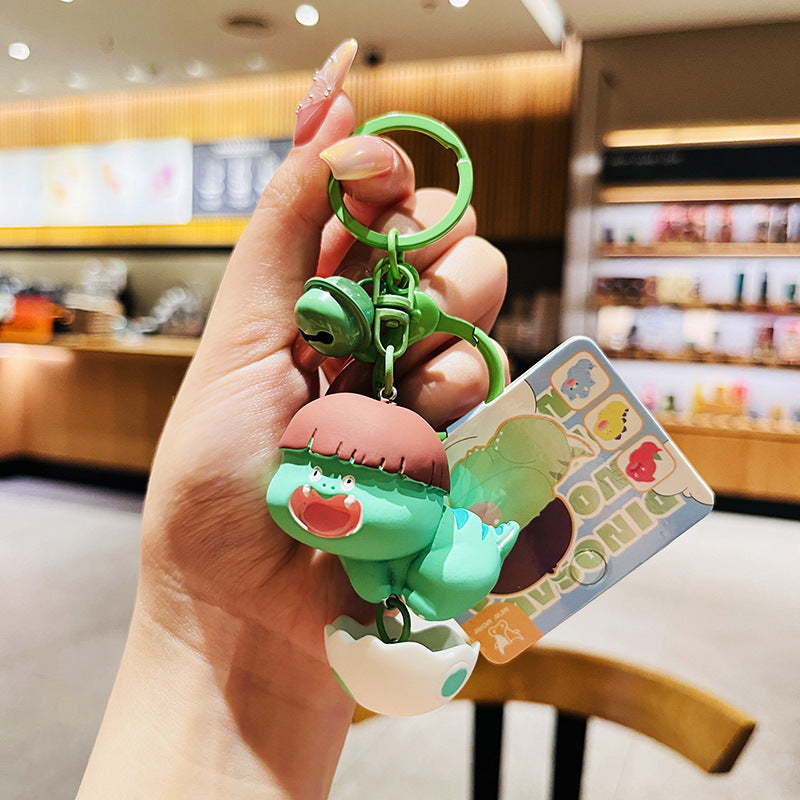 Cartoon Dinosaur Holding Egg PVC Soft Keychain
