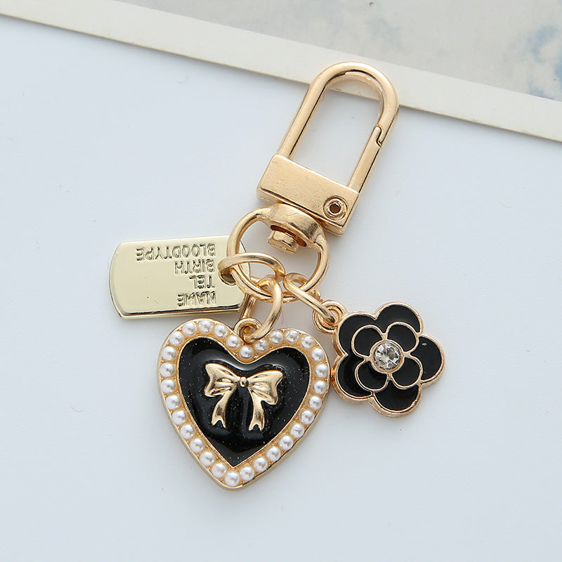 Bowknot Pearl Alphabet Heart Hair Ball Alloy Keychains