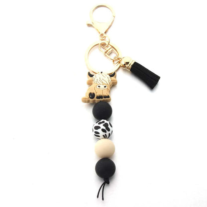 Cartoon West Highland Cow Silicone Beaded Keychain