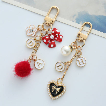 Bowknot Pearl Alphabet Heart Hair Ball Alloy Keychains