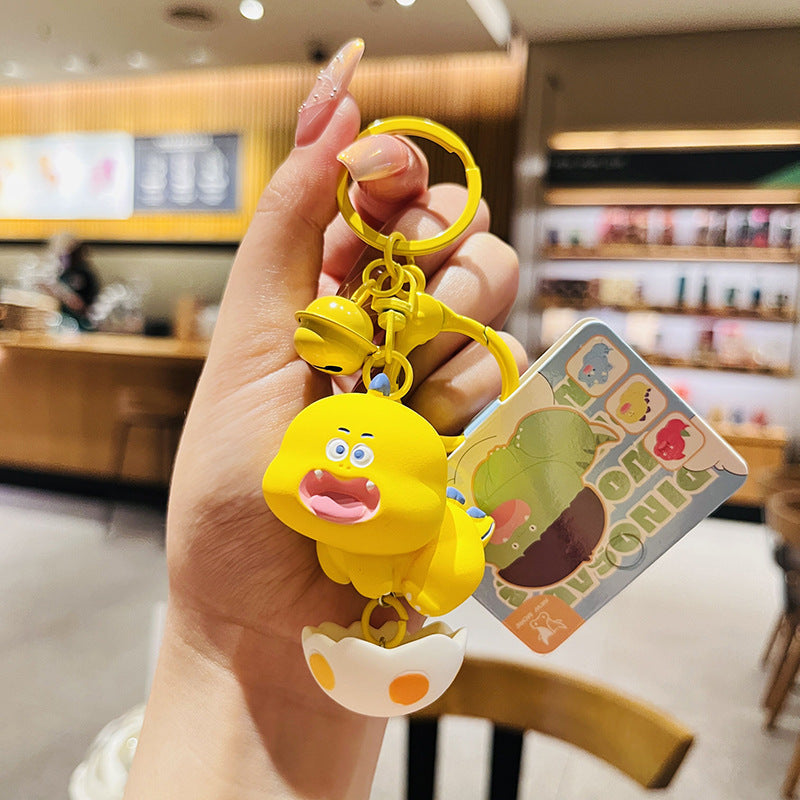 Cartoon Dinosaur Holding Egg PVC Soft Keychain