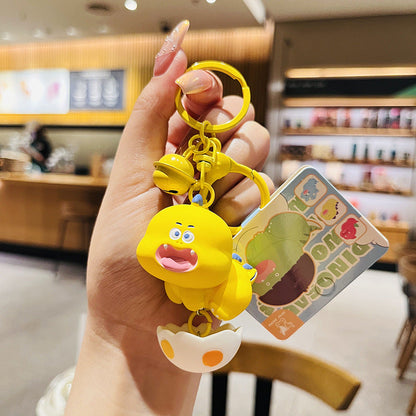 Cartoon Dinosaur Holding Egg PVC Soft Keychain
