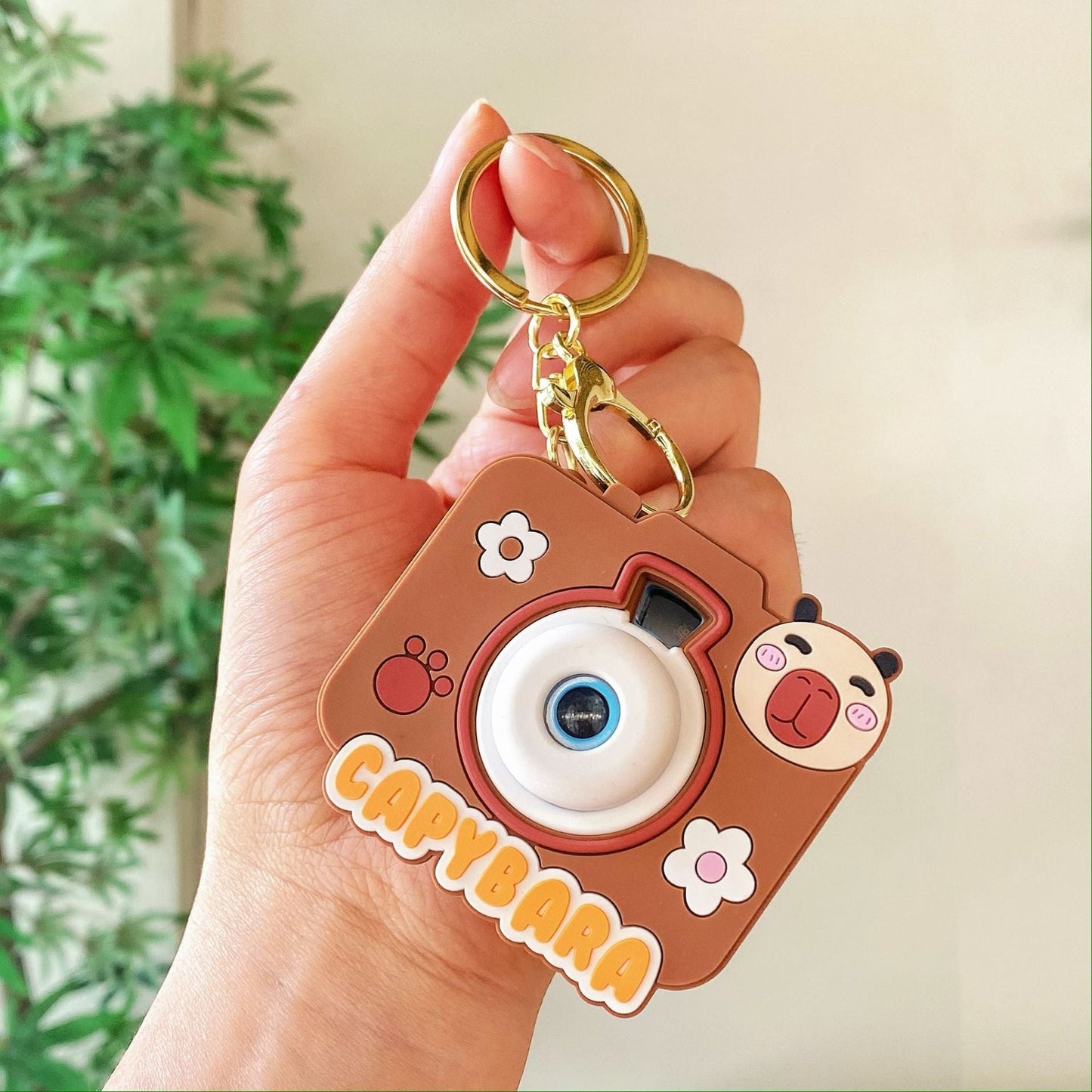Creative Small Capybara Luminous Silicone Camera Keychain
