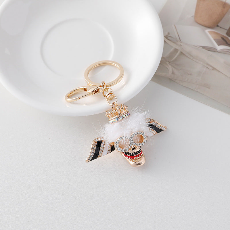 Diamond Inlaid Plush Skull Metal Keychain