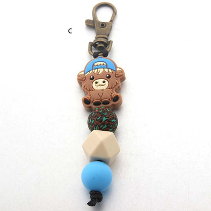 Wholesale Cartoon Cow Silicone Beaded Keychain