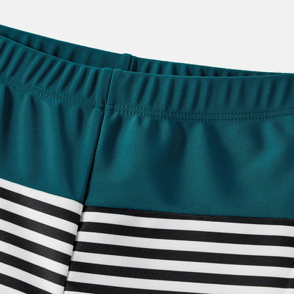 Family Matching: One-Shoulder Swimsuits & Striped Trunks