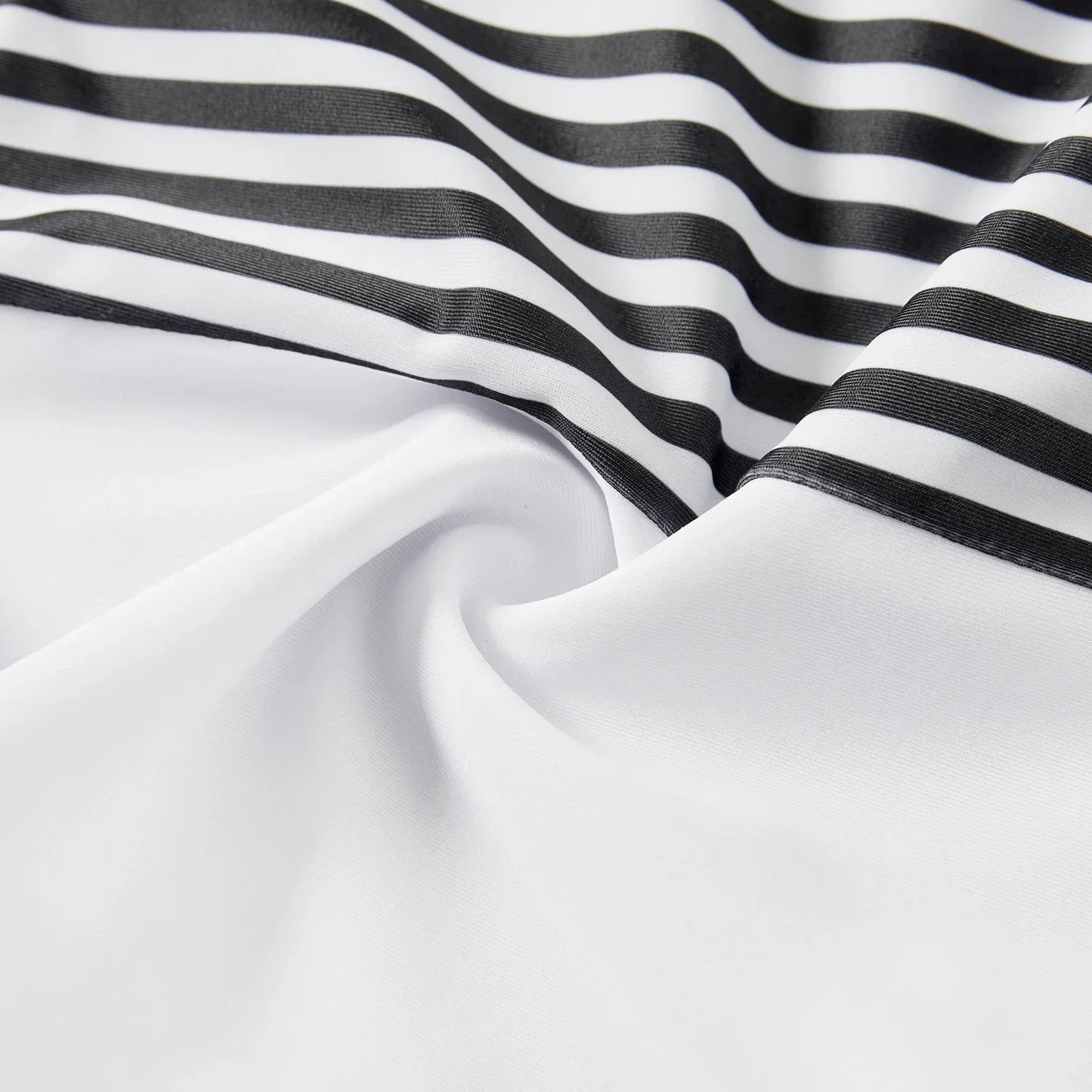 Family Matching: One-Shoulder Swimsuits & Striped Trunks
