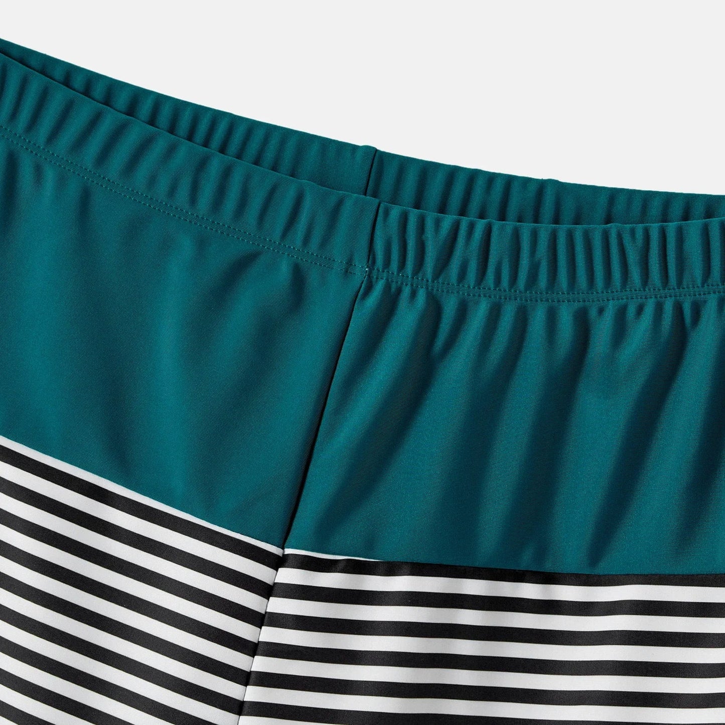 Family Matching: One-Shoulder Swimsuits & Striped Trunks