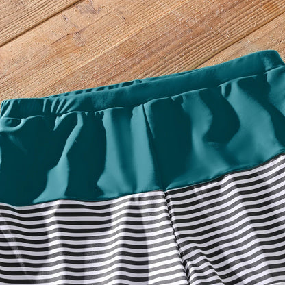 Family Matching: One-Shoulder Swimsuits & Striped Trunks