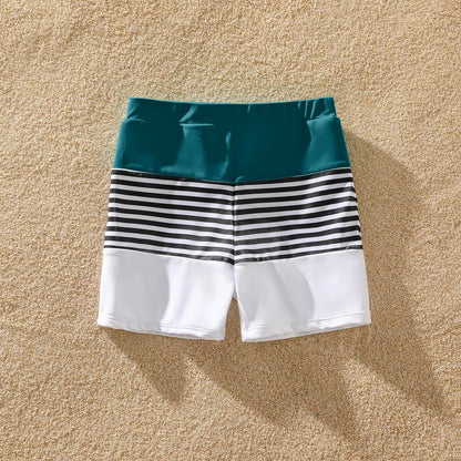 Family Matching: One-Shoulder Swimsuits & Striped Trunks