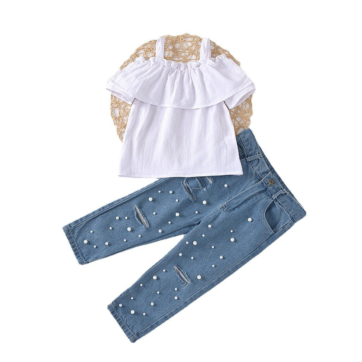 White ruffled suspender top with nail beads and pierced jeans