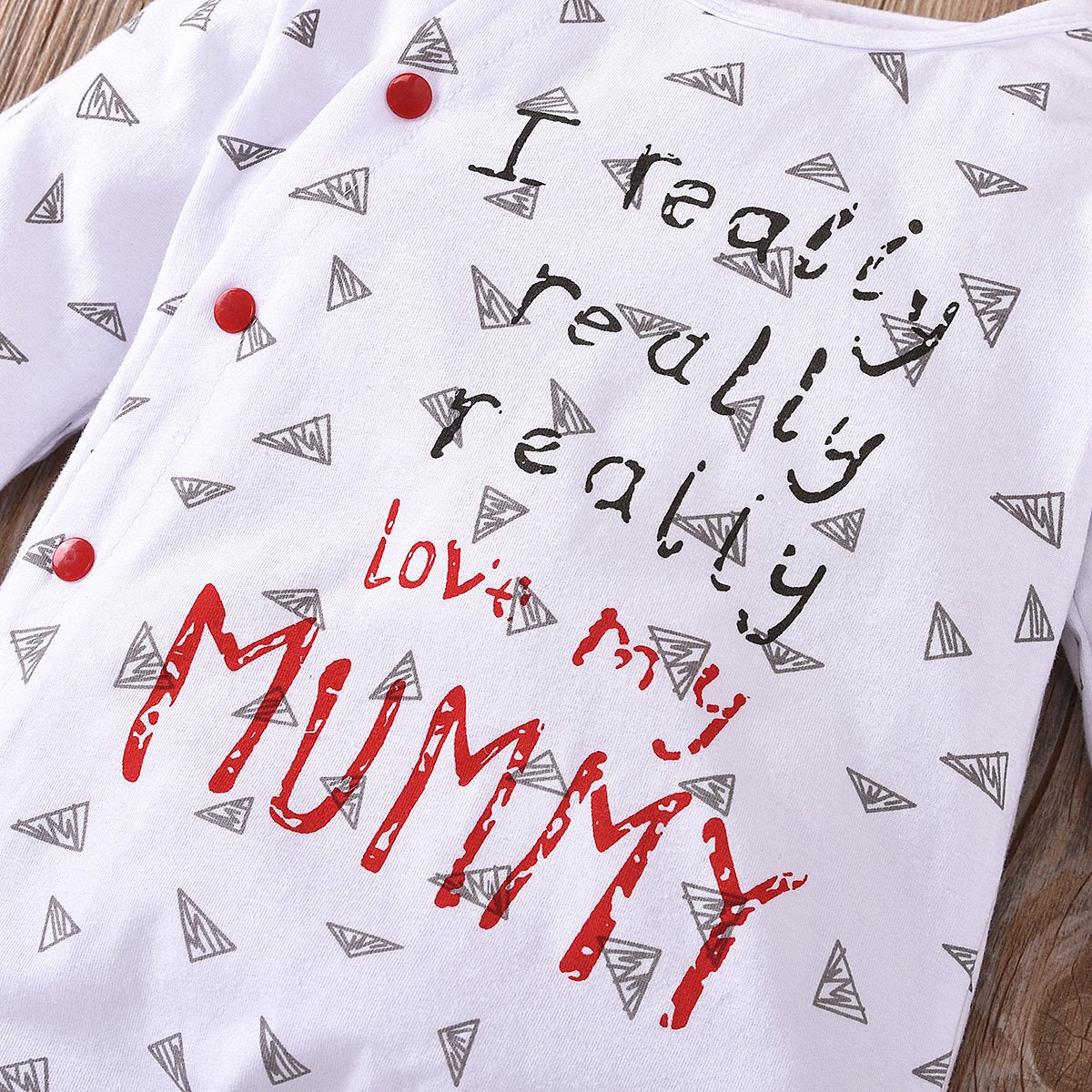 White long sleeved printed BODYSUIT
